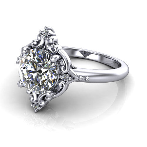 Hazel round vintage filigree engagement ring in 14K White Gold, three-quarter perspective showing the round center in an ornate filigree scroll frame above a plain band