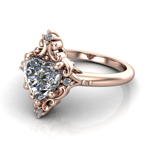 Hazel heart vintage filigree engagement ring in 14K Rose Gold, three-quarter perspective showing the heart center in an ornate filigree scroll frame above a plain band