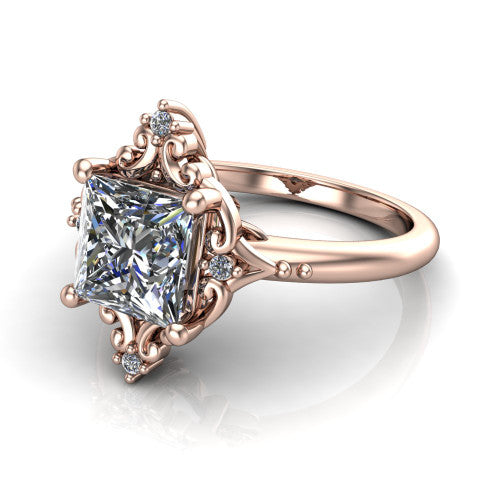 Hazel princess vintage filigree engagement ring in 18K Rose Gold, three-quarter perspective showing the princess center in an ornate filigree scroll frame above a plain band