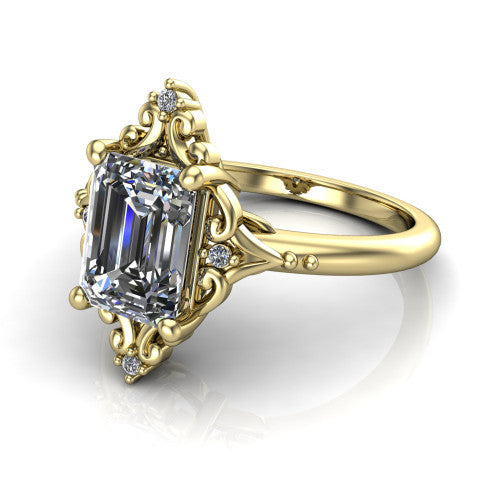 Hazel emerald vintage filigree engagement ring in 14K Yellow Gold, three-quarter perspective showing the emerald center in an ornate filigree scroll frame above a plain band