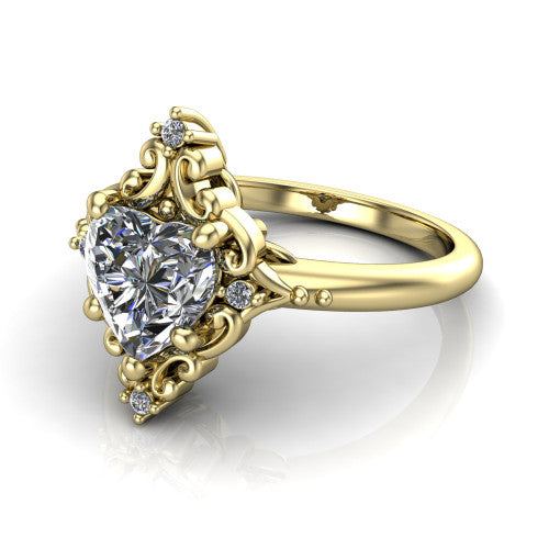 Hazel heart vintage filigree engagement ring in 18K Yellow Gold, three-quarter perspective showing the heart center in an ornate filigree scroll frame above a plain band