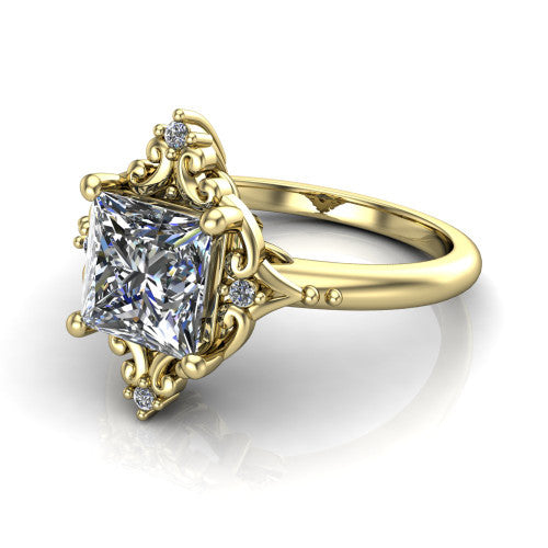 Hazel princess vintage filigree engagement ring in 18K Yellow Gold, three-quarter perspective showing the princess center in an ornate filigree scroll frame above a plain band