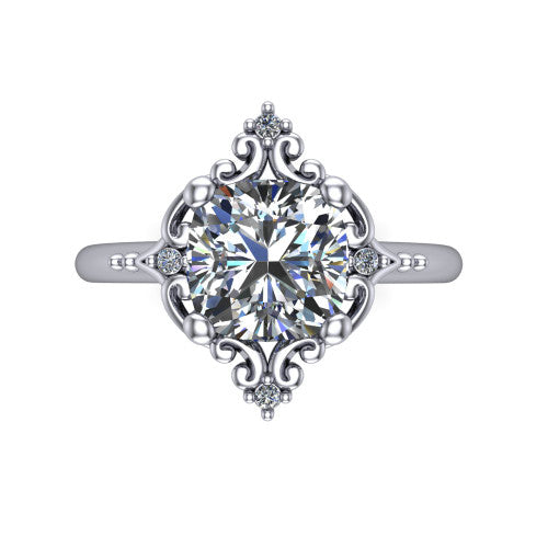 Hazel cushion vintage filigree engagement ring in Platinum, top-down view showing the vintage scrollwork frame and corner diamond accents around the cushion center