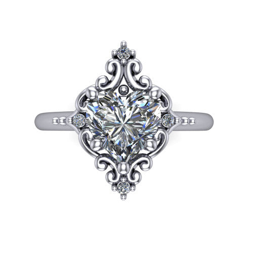 Hazel heart vintage filigree engagement ring in 14K White Gold, top-down view showing the vintage scrollwork frame and corner diamond accents around the heart center