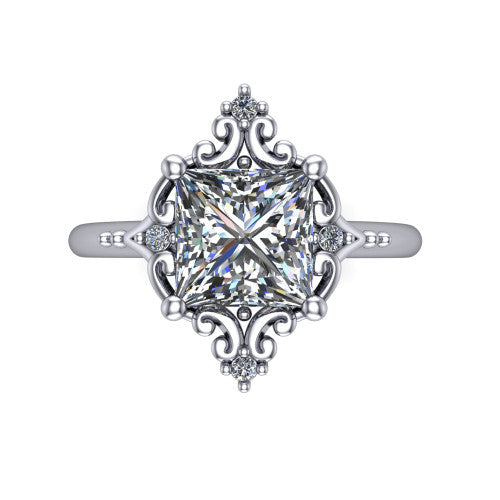 Hazel princess vintage filigree engagement ring in 18K White Gold, top-down view showing the vintage scrollwork frame and corner diamond accents around the princess center