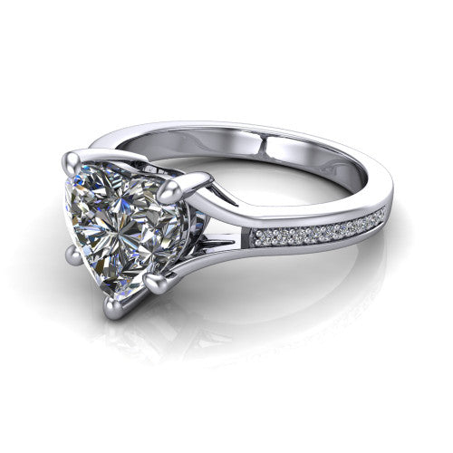 Isla heart classic solitaire engagement ring in 14K White Gold, three-quarter perspective showing the heart center on claw prongs above a channel-set pav&eacute; split shank