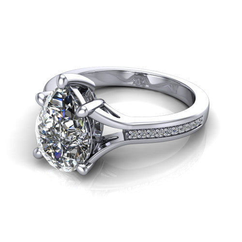 Isla pear classic solitaire engagement ring in 14K White Gold, three-quarter perspective showing the pear center on claw prongs above a channel-set pav&eacute; split shank