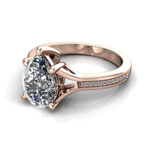 Isla pear classic solitaire engagement ring in 14K Rose Gold, three-quarter perspective showing the pear center on claw prongs above a channel-set pav&eacute; split shank