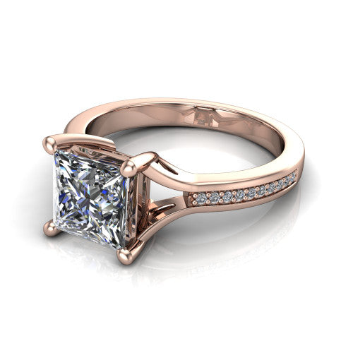 Isla princess classic solitaire engagement ring in 14K Rose Gold, three-quarter perspective showing the princess center on claw prongs above a channel-set pav&eacute; split shank