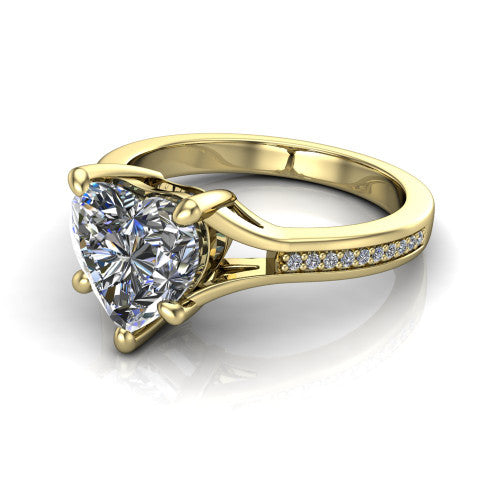 Isla heart classic solitaire engagement ring in 18K Yellow Gold, three-quarter perspective showing the heart center on claw prongs above a channel-set pav&eacute; split shank