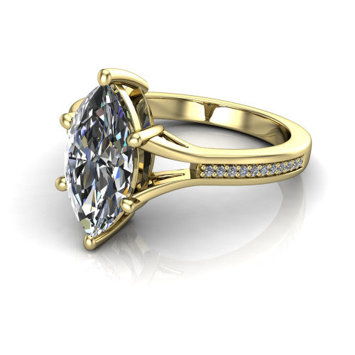 Isla marquise classic solitaire engagement ring in 14K Yellow Gold, three-quarter perspective showing the marquise center on claw prongs above a channel-set pav&eacute; split shank
