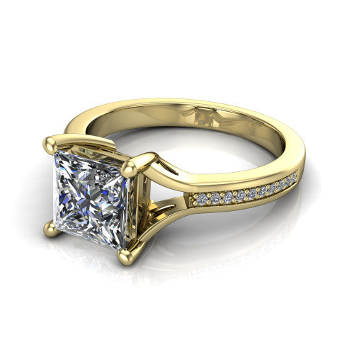 Isla princess classic solitaire engagement ring in 14K Yellow Gold, three-quarter perspective showing the princess center on claw prongs above a channel-set pav&eacute; split shank