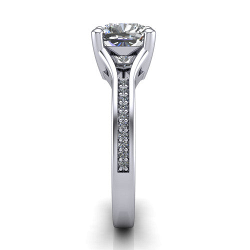 Isla cushion classic solitaire engagement ring in 14K White Gold, side profile showing the channel-set pav&eacute; split shank with polished edges rising to the cushion center