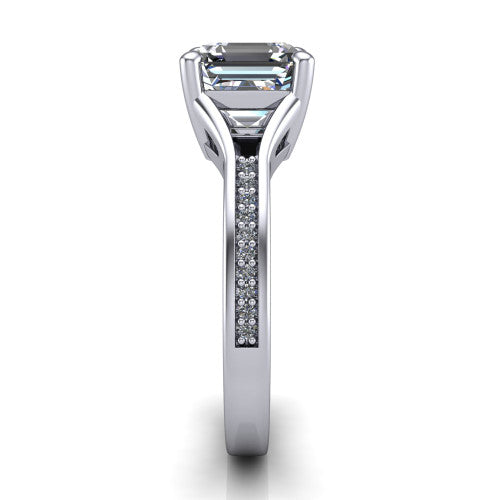 Isla square emerald classic solitaire engagement ring in 18K White Gold, side profile showing the channel-set pav&eacute; split shank with polished edges rising to the square emerald center