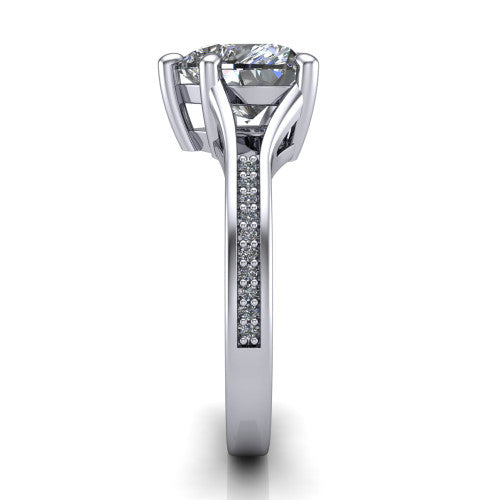 Isla heart classic solitaire engagement ring in Platinum, side profile showing the channel-set pav&eacute; split shank with polished edges rising to the heart center