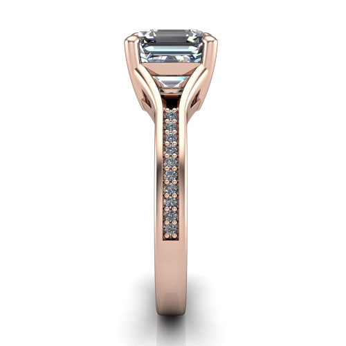 Isla square emerald classic solitaire engagement ring in 14K Rose Gold, side profile showing the channel-set pav&eacute; split shank with polished edges rising to the square emerald center