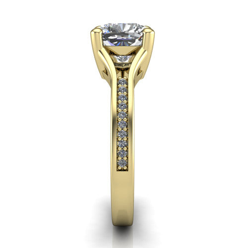 Isla cushion classic solitaire engagement ring in 14K Yellow Gold, side profile showing the channel-set pav&eacute; split shank with polished edges rising to the cushion center