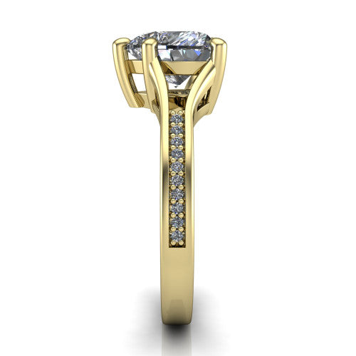 Isla heart classic solitaire engagement ring in 18K Yellow Gold, side profile showing the channel-set pav&eacute; split shank with polished edges rising to the heart center
