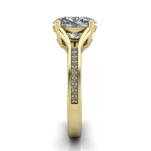 Isla oval classic solitaire engagement ring in 14K Yellow Gold, side profile showing the channel-set pav&eacute; split shank with polished edges rising to the oval center