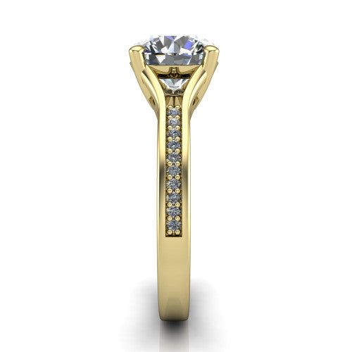 Isla round classic solitaire engagement ring in 14K Yellow Gold, side profile showing the channel-set pav&eacute; split shank with polished edges rising to the round center