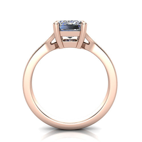 Isla emerald classic solitaire engagement ring in 14K Rose Gold, through-finger front profile showing the emerald center raised above the channel-set split shank