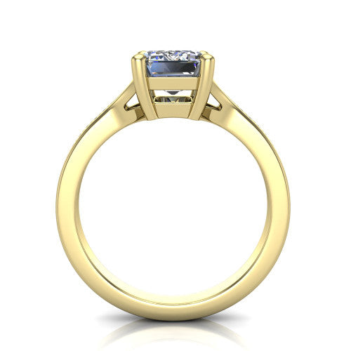 Isla emerald classic solitaire engagement ring in 18K Yellow Gold, through-finger front profile showing the emerald center raised above the channel-set split shank