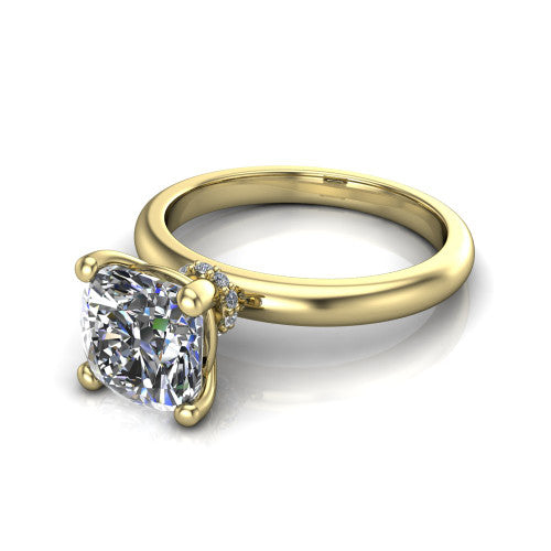 Delilah cushion hidden halo engagement ring in 14K Yellow Gold, three-quarter perspective showing the cushion center on claw prongs above a plain band with a hidden pav&eacute; halo