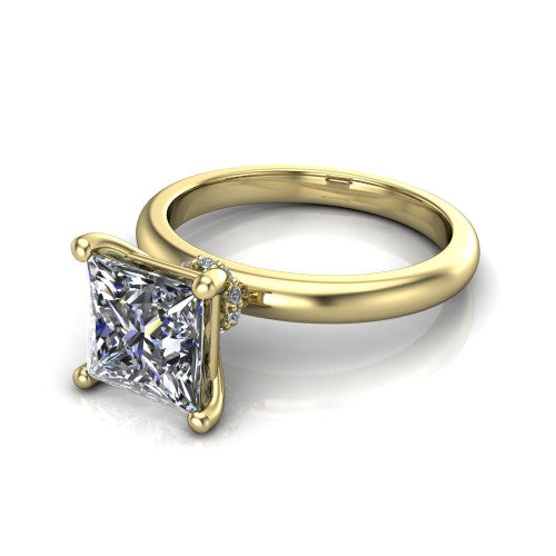 Delilah princess hidden halo engagement ring in 14K Yellow Gold, three-quarter perspective showing the princess center on claw prongs above a plain band with a hidden pav&eacute; halo
