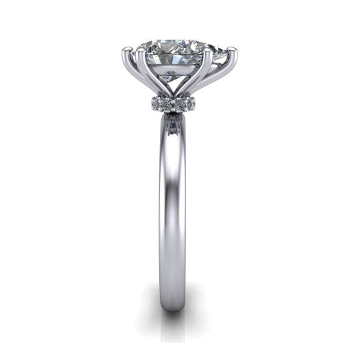 Delilah pear hidden halo engagement ring in Platinum, side profile showing the hidden pav&eacute; halo collar and the plain polished band in profile