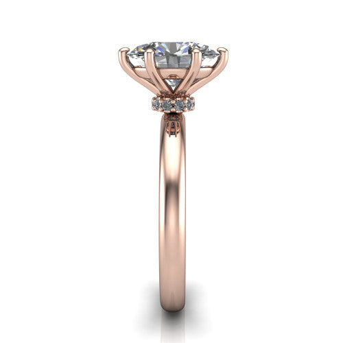 Delilah oval hidden halo engagement ring in 18K Rose Gold, side profile showing the hidden pav&eacute; halo collar and the plain polished band in profile
