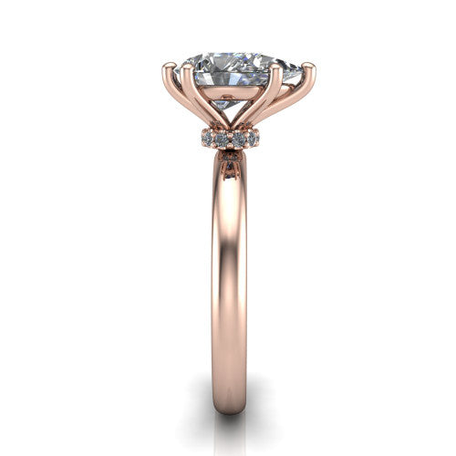 Delilah pear hidden halo engagement ring in 14K Rose Gold, side profile showing the hidden pav&eacute; halo collar and the plain polished band in profile