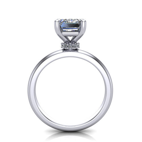 Delilah emerald hidden halo engagement ring in Platinum, through-finger front profile showing the hidden pav&eacute; halo beneath the emerald center