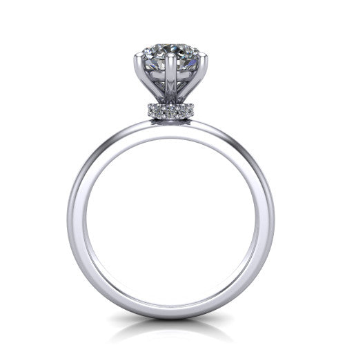 Delilah pear hidden halo engagement ring in 14K White Gold, through-finger front profile showing the hidden pav&eacute; halo beneath the pear center