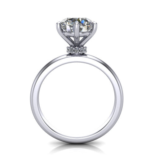 Delilah round hidden halo engagement ring in Platinum, through-finger front profile showing the hidden pav&eacute; halo beneath the round center