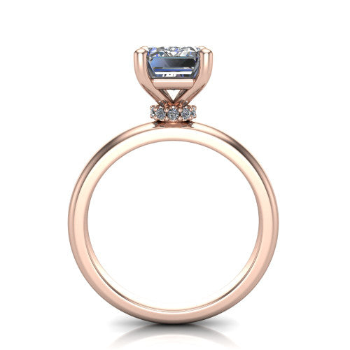Delilah emerald hidden halo engagement ring in 14K Rose Gold, through-finger front profile showing the hidden pav&eacute; halo beneath the emerald center