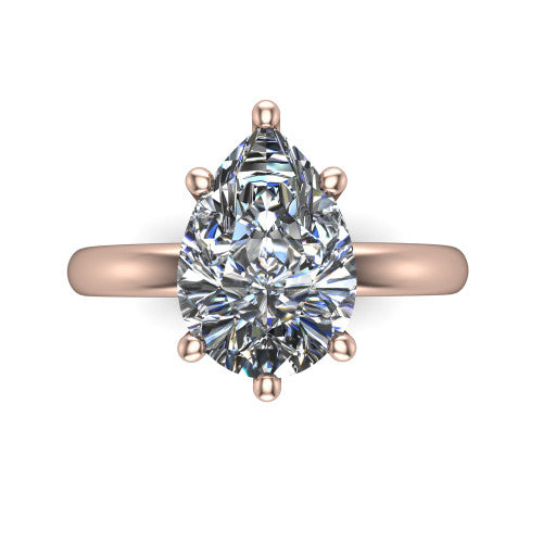 Delilah pear hidden halo engagement ring in 14K Rose Gold, top-down view showing the unhaloed pear solitaire center