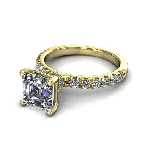 Gabriella square emerald hidden halo engagement ring in 18K Yellow Gold, three-quarter perspective showing the square emerald center on claw prongs above a pav&eacute; band with a hidden halo