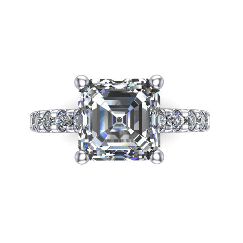 Gabriella emerald hidden halo engagement ring in Platinum, top-down view showing the emerald center and the pav&eacute; diamond shoulders