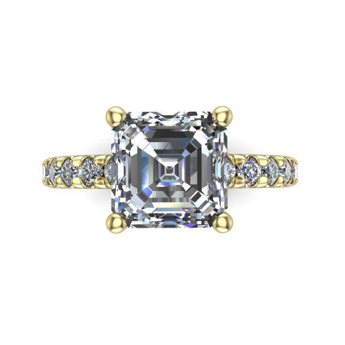 Gabriella emerald hidden halo engagement ring in 14K Yellow Gold, top-down view showing the emerald center and the pav&eacute; diamond shoulders