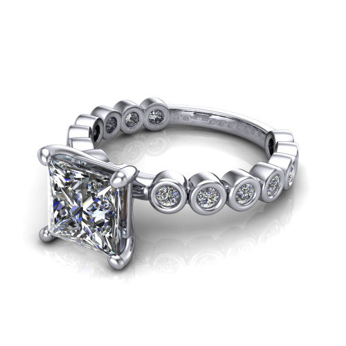 Kinsley princess solitaire engagement ring in 14K White Gold with bezel-set diamond accent band, three-quarter perspective view