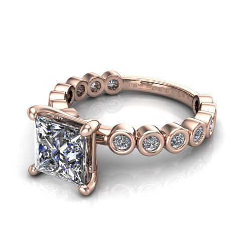 Kinsley princess solitaire engagement ring in 14K Rose Gold with bezel-set diamond accent band, three-quarter perspective view
