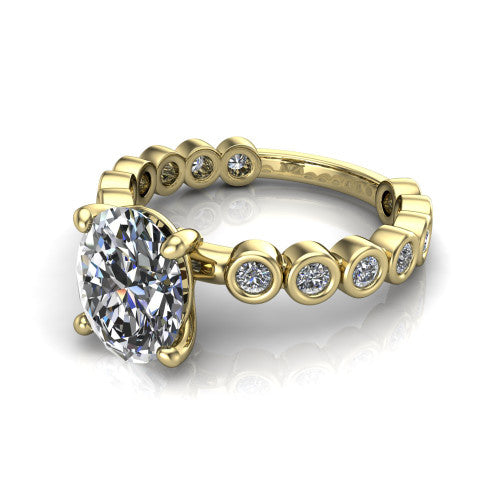 Kinsley oval solitaire engagement ring in 18K Yellow Gold with bezel-set diamond accent band, three-quarter perspective view