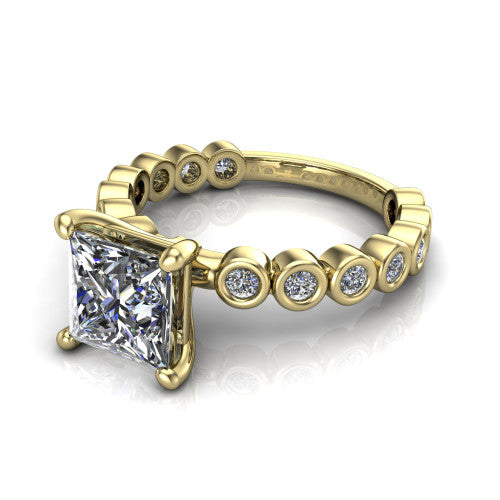Kinsley princess solitaire engagement ring in 14K Yellow Gold with bezel-set diamond accent band, three-quarter perspective view
