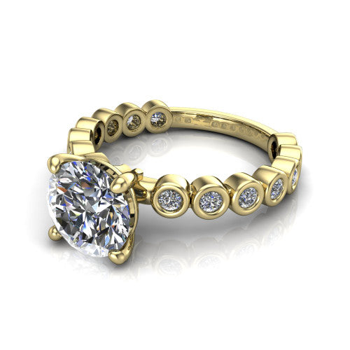 Kinsley round solitaire engagement ring in 14K Yellow Gold with bezel-set diamond accent band, three-quarter perspective view