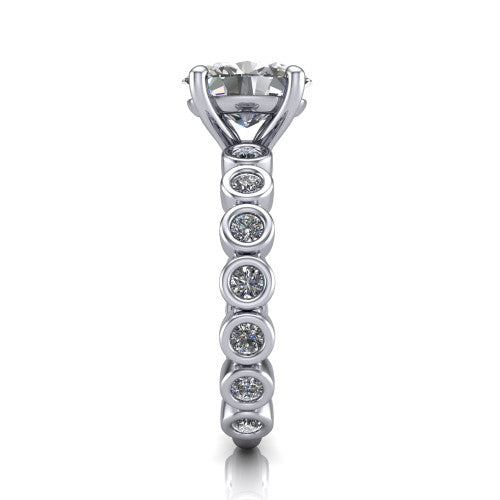 Kinsley oval solitaire engagement ring in Platinum with bezel-set diamond accent band, side profile showing the bezel-set diamond shank