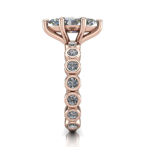 Kinsley marquise solitaire engagement ring in 18K Rose Gold with bezel-set diamond accent band, side profile showing the bezel-set diamond shank