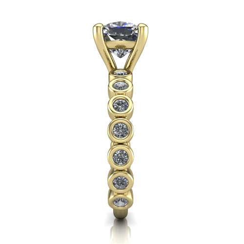 Kinsley cushion solitaire engagement ring in 18K Yellow Gold with bezel-set diamond accent band, side profile showing the bezel-set diamond shank