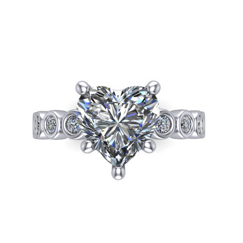 Kinsley heart solitaire engagement ring in 18K White Gold with bezel-set diamond accent band, top-down view of the center stone and bezel band