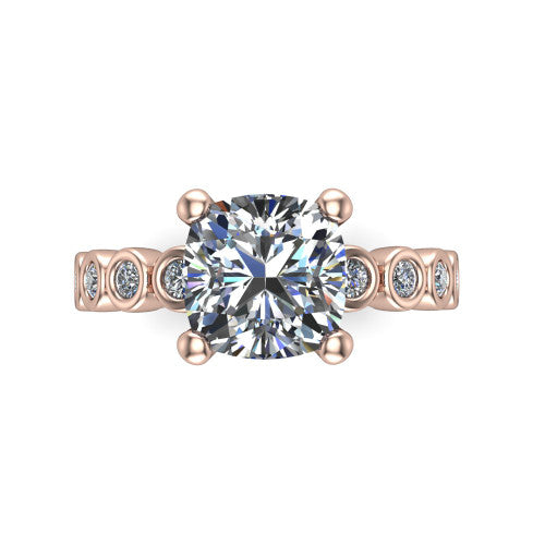 Kinsley cushion solitaire engagement ring in 14K Rose Gold with bezel-set diamond accent band, top-down view of the center stone and bezel band