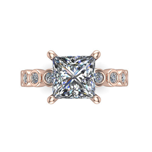 Kinsley princess solitaire engagement ring in 14K Rose Gold with bezel-set diamond accent band, top-down view of the center stone and bezel band